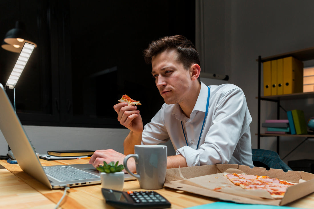 Person having a quick snack while working from home