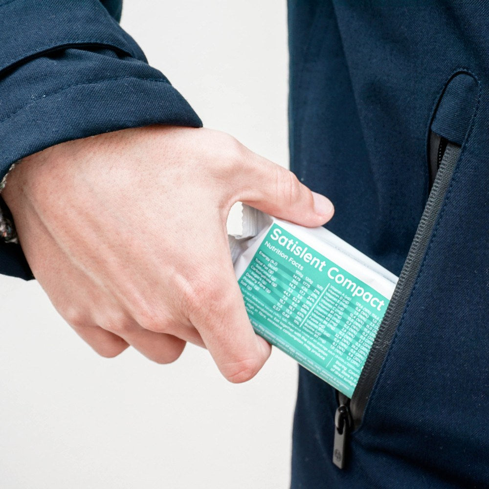 Barrita Satislent Compact sacada del bolsillo de una chaqueta